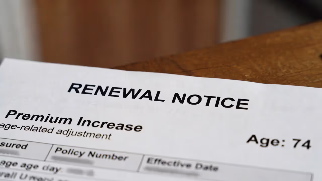 Renewal notice example showing a premium increase for a 74-year-old attributed to age-related adjustment.